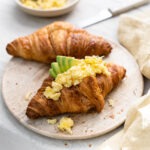 Croissant scrambled eggs avocado
